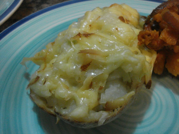 Picture of baked leek and potato boat on a plate